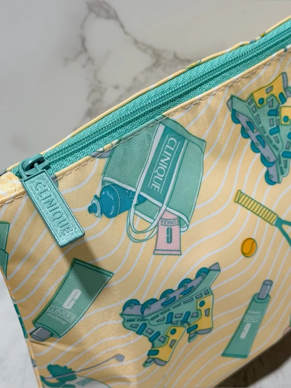 CLINIQUE Yellow & Teal Tennis Graphic Cosmetic Pouch